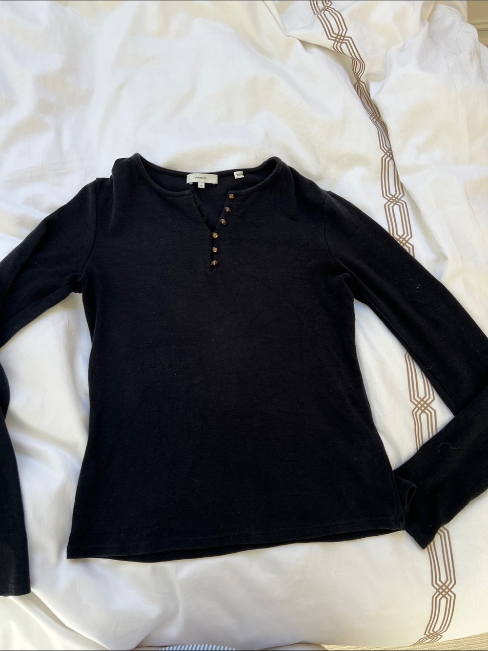 Women’s vent sweater with tiger eye buttons